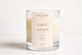 a candle in a glass
